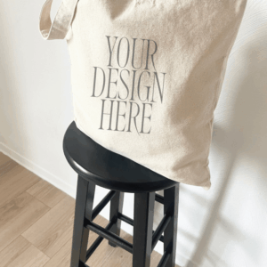 Tote Bag Mockup – Draped on Black Stool – Soft Corner Lighting